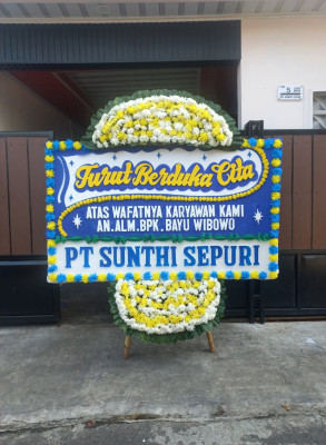 Papan Bunga Duka di Giring